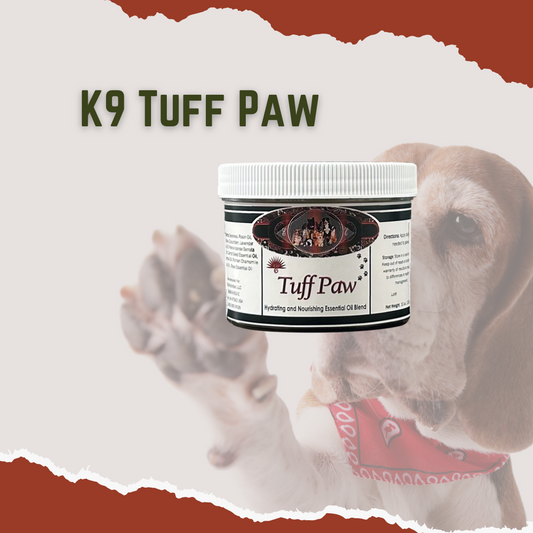 A container of k9 Tuff Paw supplement with a background image of a dog's paw and a dog looking at the camera